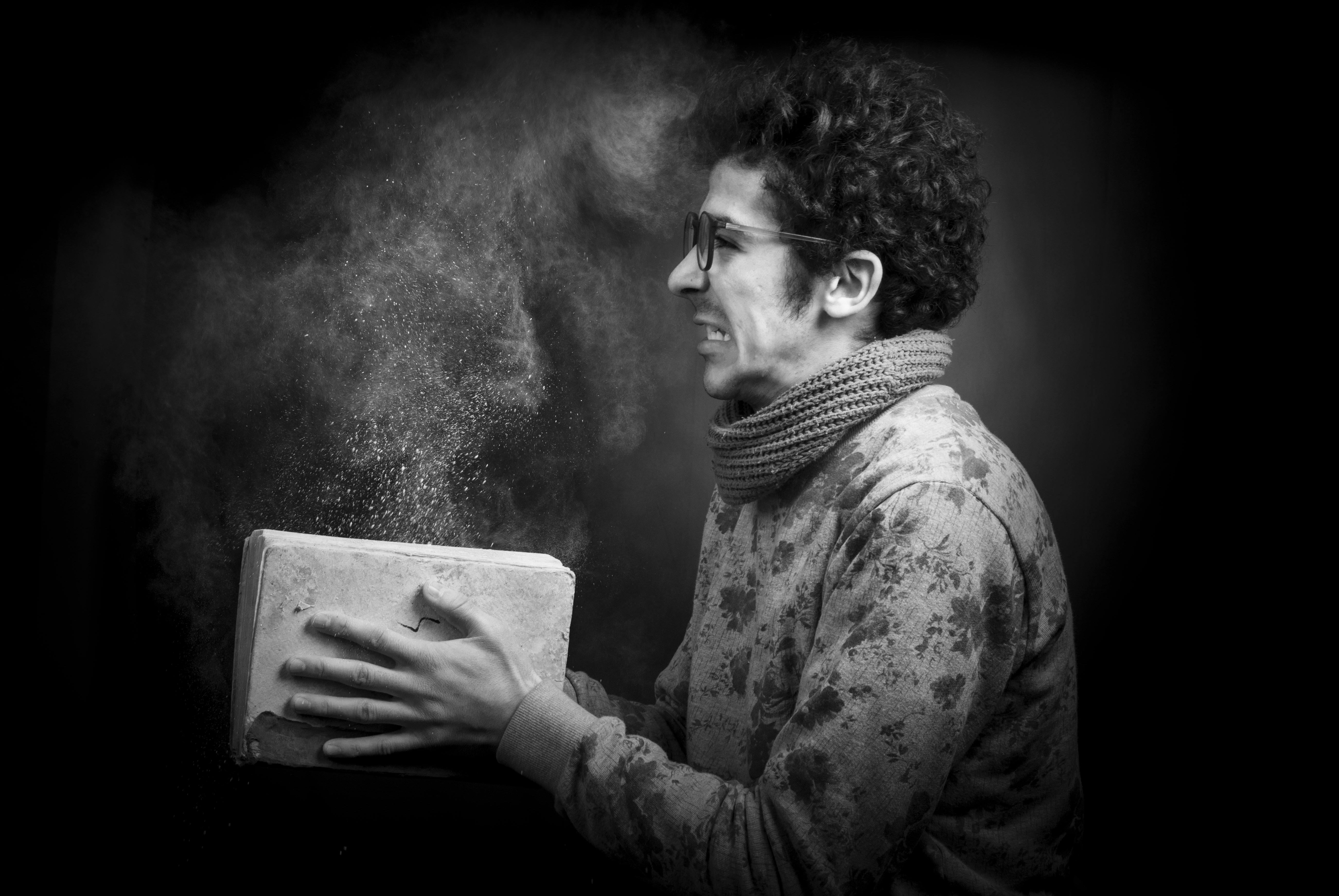 man covered in soot powder