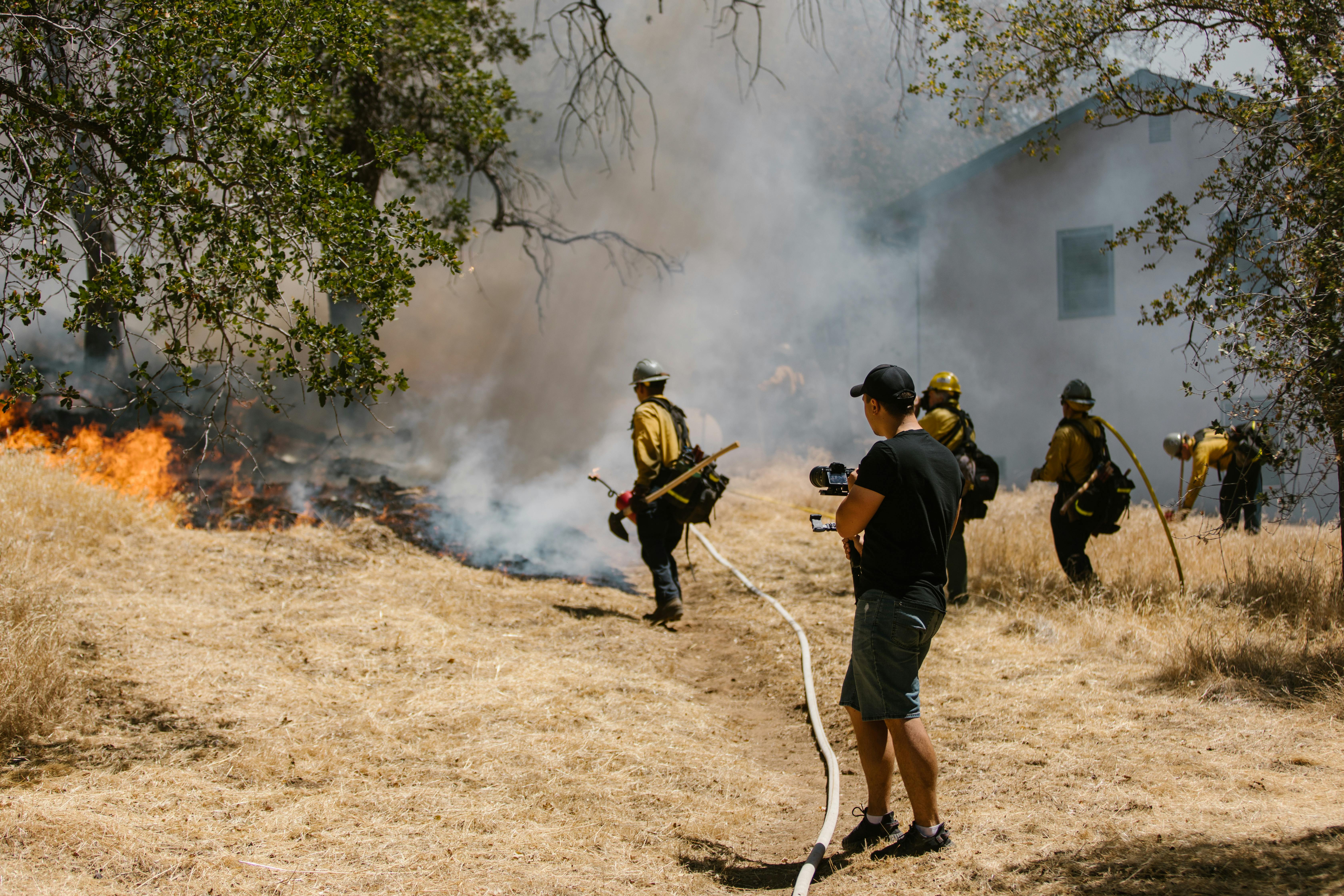 fire fighter clearing damage